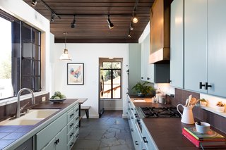 The extension increased the floor space of the house, while staying true to its original midcentury roots.