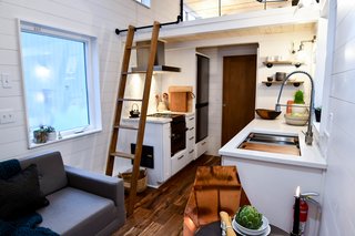 Ladder access frees up space downstairs and gives the living area a more open feel. 