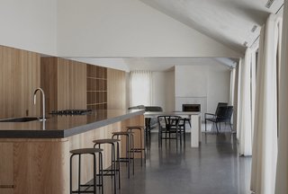 "The geometries converse with the impressive body of the existing farm, at the same time making their mark in the natural surroundings," notes Cécile Combelle, co-founder of the firm. 