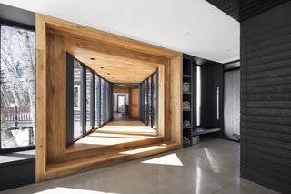 Benches with hidden storage were built into the walls to provide cozy reading or contemplation nooks where each resident can enjoy some private time.