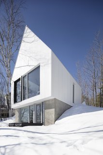 In winter, the extension looks as if it’s covered in snow.