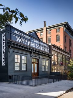 The building’s historical façade was preserved and the the original company sign was retained.