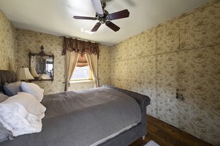 A separate one-bedroom apartment on the third floor is included in the sale.