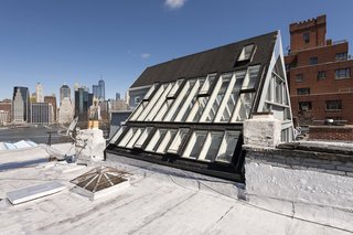 The roof is fitted with unique, architectural skylights.