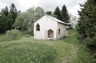 Cut out of the walls at different heights, these doors reveal the unusual and quirky interior arrangement of the chalet. 