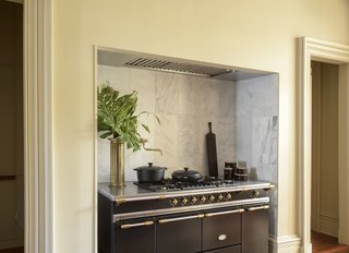 A compact Le Creuset kitchen.