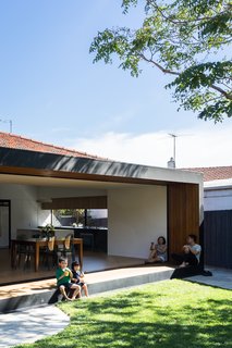 "This long rectangular view was carefully detailed to widen the perspective of the garden, creating an optical illusion of making the garden itself feel wider then it actually is," says Ong. 