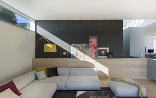 "We designed a column-free interior space for the entire upper floor, indoor and outdoors, to connect the spaces," says McLeod. "This structural approach, which includes outdoor space in the span of a roof system, is unusual. The seven sliding glazed panels at the rear and corner of the house allow it to open up onto large exterior spaces."