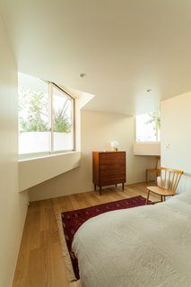 The bedrooms and gallery spaces are located within the concrete boxes. 