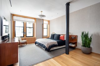 To the south of the "great room" is a spacious master bedroom with a king-size bed.