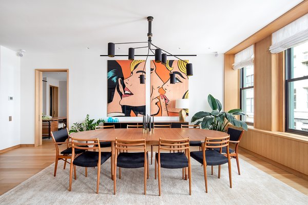 The apartment has rift-cut white oak floors, as well as floor-to-ceiling white oak millwork in the living lounge and dining area.