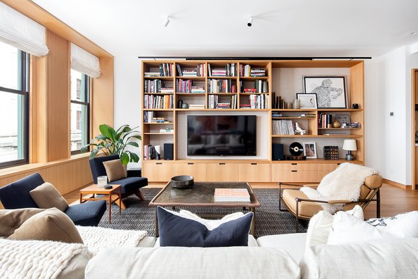 In the living area, six large windows on the west-facing wall look out toward the streets of SoHo.