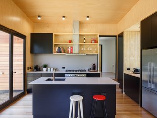 The couple wanted a home where they could relax, cook meals, listen to music together, and leave the hustle and bustle of the city behind. 