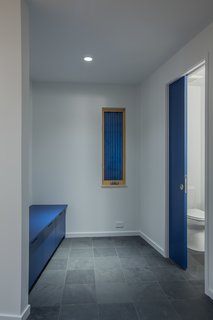 The walls and ceilings, which were painted white, work beautifully with the wide-plank pine flooring to brighten the interiors and give the living areas a light, breezy feel. 