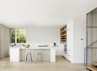 A breakfast bar is also in the kitchen.