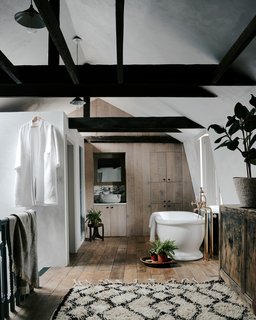 "Historically, this topmost room would have housed the silk weavers' rooms, but the room is now Zen, one where you might relax into a freestanding tub or sink into a bed of plumped up pillows," says Eayrs.