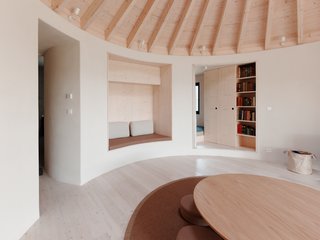 From the main room, passageways lead to the bedroom and bathroom.