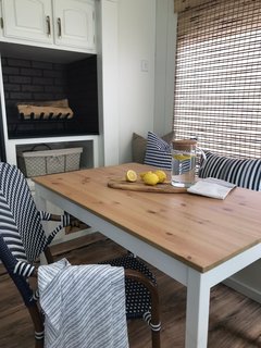 This not only solved the water pump obstacle, but it also created extra storage, and allowed the couple to move the dining zone to a more spacious part of the trailer. 