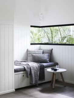 This reading nook offers a calm environment to rest and relax.