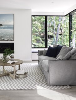 Turning to the lush green rainforest surroundings for inspiration, the team has updated the interiors with smoked oak floors and soft, neutral colors to better highlight the property's unique setting.