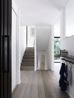 The designers have added a bright, light-filled extension to the 15-year-old house to make it more commodious, as well as to improve the flow of sunlight through the interiors.