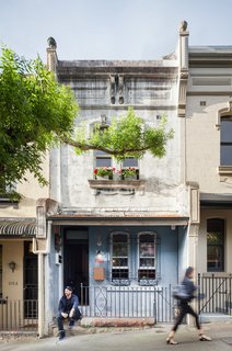 The 1,184-square-foot house is located within a 100-year building. The architects kept much of the existing exterior.