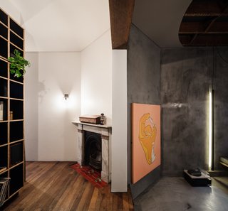 Hidden behind a jib door in the library wall is a laundry and storage area.