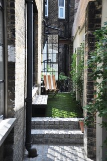 Before the renovation, the darkest corner of the home was at the back of the property. To bring light to this part of the house, Scott created an internal roof terrace on the second floor.