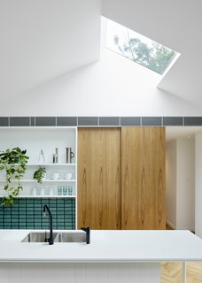 The spotted gum veneer pays homage to the variety of local gum tree species.