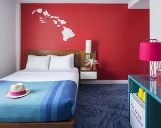 The custom drapery and blankets were designed by BHDM. The colorful, customized furniture are from BluDot and Missana.