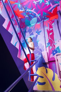 Artist DJ Neff was comissioned to do the murals at the entry, the pool deck, and along the stairwell leading up to the pool.