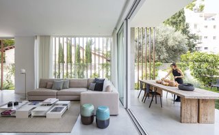The roof hangs over the patio to provide shelter from the intense sunlight.