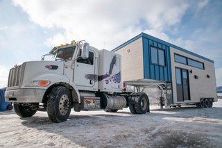The 420-square-foot Sakura has a high-performance design with a bright reading loft, and a lounge area that can be transformed into a dining room for six. 