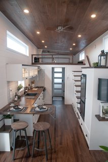 The trio, who are presently completing their tenth custom-built tiny house, approach their work with a great deal of empathy for their clients. 