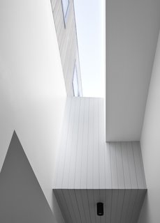 To avoid a dark, claustrophobic feel, Robertson introduced a skylight to open up and brighten the interiors. 