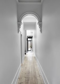 A look at one of the restored stucco arches along the ceiling of the hallway.