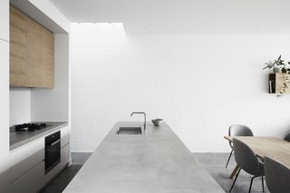Hard materials such as polished concrete were used for the interior floors and bench-tops. The interior brick walls were all painted white.