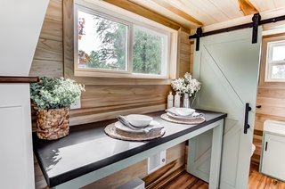 The Clover's interior walls are finished in poplar wood, and its floors are covered in vinyl.