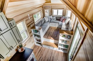 There is plenty of built-in storage and shelves for books along the walls.