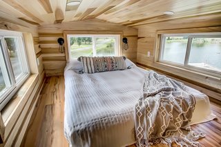 Steps lead up to a sleeping loft that can accommodate two people on a double bed.