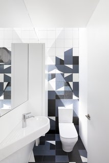 Mutina tiles have been used for the floor and walls in the kids' bathroom. 