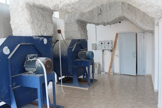 Before: a peek at the heavy machinery that was once stored in the space.