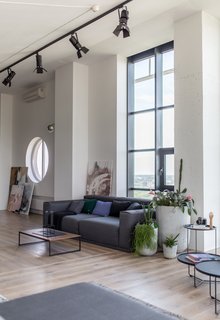The optimized layout includes an open-plan living room, dining area, and kitchen, along with three bedrooms and three-and-a-half baths.