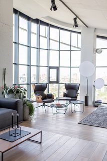 Now, common areas are concentrated around a right-angled section that follows the glazed window-walls. 