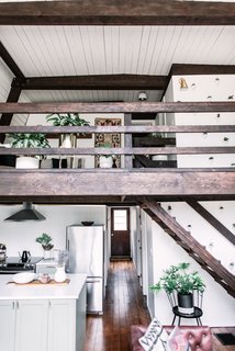 The house has two levels, and a lofted lounge in the front section of the upper floor.