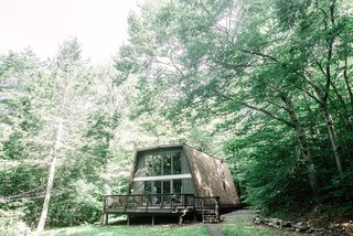 After: "We really didn’t have any experience taking on a project of this scale," says Ely. "We’re both generally impulsive people, so we purchased this house—which was a broken shell of a space—with really no plan on how to proceed."