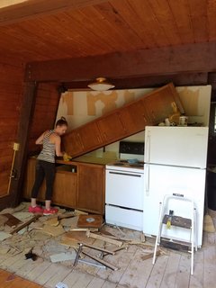 It took them three attempts to get the beautiful kitchen cabinets perfectly level. 