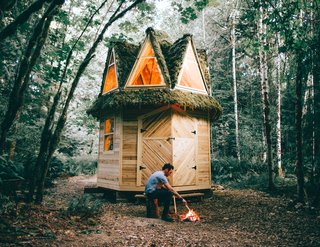 "I used the same roofing concept on this cabin as I did with the second, covering it in metal, chicken wire and moss," says Witzling.