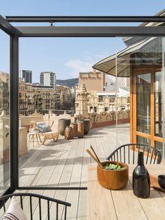 Wood vases on the roof deck by Meritxell Ribé-The Room Studio.