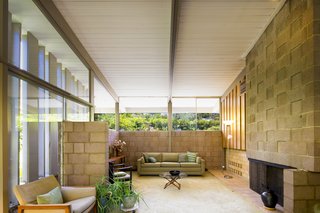 The glass walls make the living areas feel brighter and more expansive.